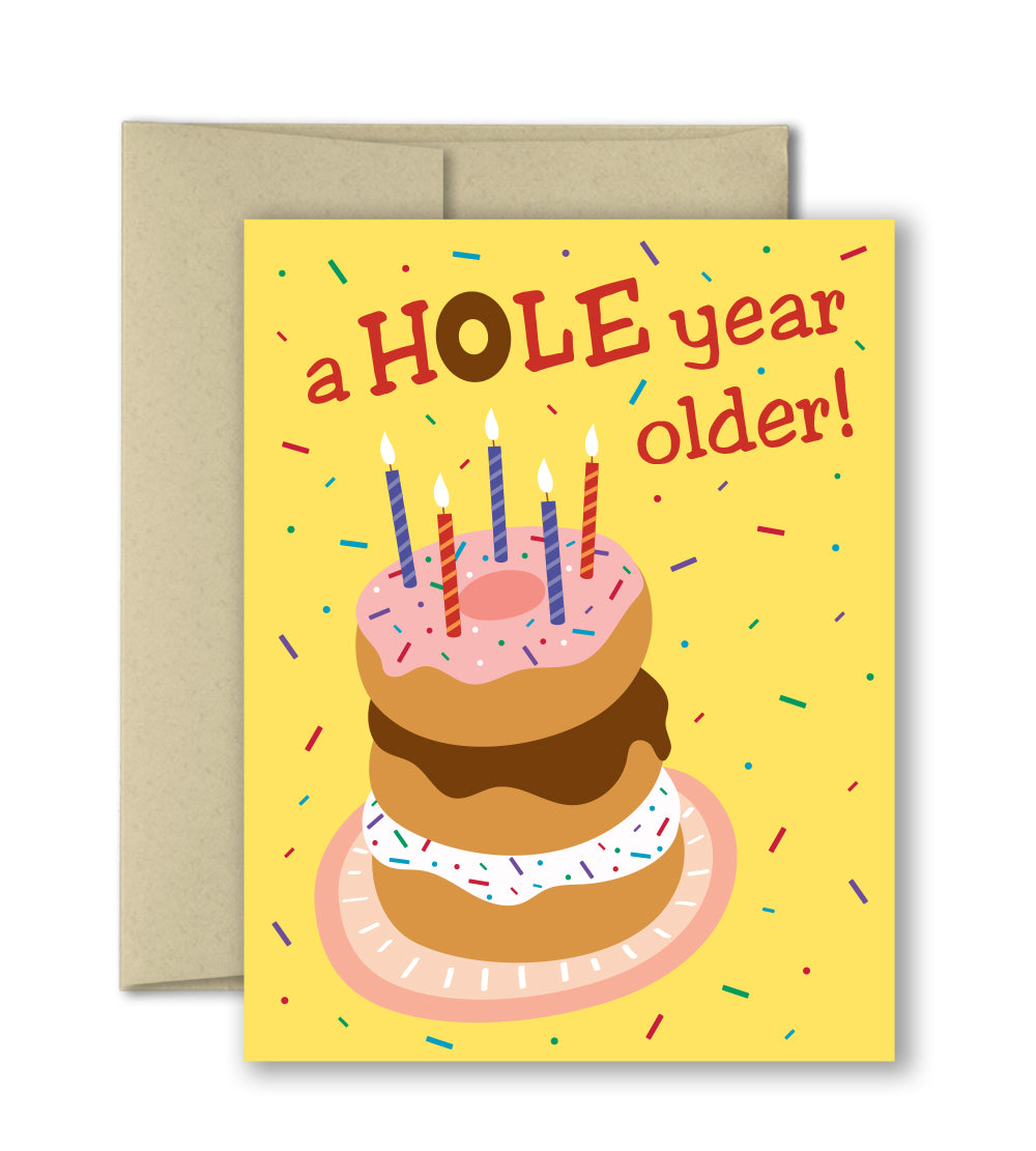 Cute birthday card with fun stacked donuts and candles.